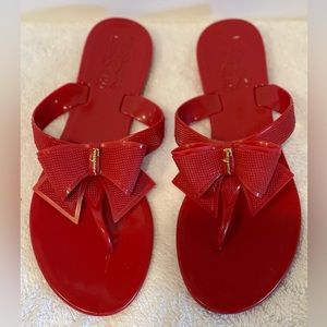 Salvatore Ferragamo designer Bali bow jelly flip flop. Size 7 red